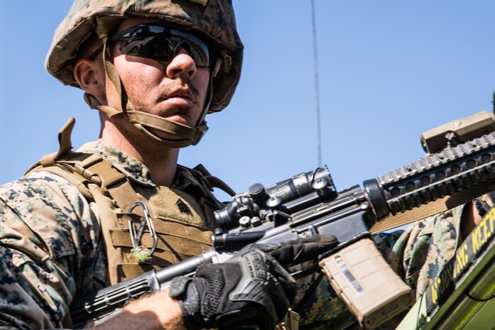 U.S. Marine Corps Sgt. Matthew Traver, a rifleman with 1st Battalion, 5th Marine Regiment, 1st Marine Division, posts security during the Marine Corps Combat Readiness Evaluation (MCCRE) on Marine Corps Base Camp Pendleton, California, Sept. 18, 2019. 5th Marines conducted a regimental-sized MCCRE that included 1st Battalion, 5th Marines, 2nd Battalion, 5th Marines, and the Regimental Headquarters to increase the combat proficiency and readiness of the regiment. The MCCRE took place over a 10-day period and served as a proof of concept for future regimental-sized MCCREs. (U.S. Marine Corps photo by Lance Cpl. Alexa M. Hernandez)