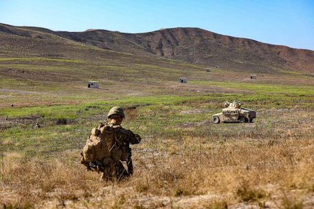 A U.S. Marine with 2nd Battalion, 5th Marine Regiment, 1st Marine Division, patrols during a Marine Corps Combat Readiness Evaluation (MCCRE) on Marine Corps Base Camp Pendleton, California, Sept. 18, 2019. 5th Marines conducted a regimental-sized MCCRE for 1st Battalion, 5th Marines and 2nd Battalion, 5th Marines, as well as the Regimental Headquarters to increase the combat proficiency and readiness of the regiment. The MCCRE took place over a 10 day period and served as proof of concept for future regimental-sized MCCREs. (U.S. Marine Corps photo by Lance Cpl. Roxanna Ortiz)