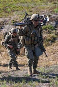 U.S. Marines with 2nd Battalion, 5th Marine Regiment, 1st Marine Division, hike during a Marine Corps Combat Readiness Evaluation (MCCRE) on Marine Corps Base Camp Pendleton, California, Sept. 21, 2019. 5th Marines conducted a regimental-sized MCCRE for 1st Battalion, 5th Marines and 2nd Battalion, 5th Marines, as well as the Regimental Headquarters to increase the combat proficiency and readiness of the regiment. The MCCRE took place over a 10 day period and served as proof of concept for future regimental-sized MCCREs. (U.S. Marine Corps photo by Lance Cpl. Roxanna Ortiz)