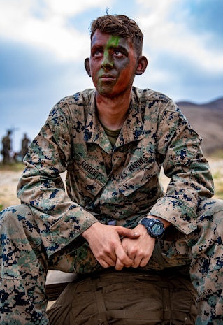 U.S. Marine Corps Cpl. James Roberts, a combat engineer with 1st Combat Engineer Battalion, 1st Marine Division, rests on his pack during a Marine Corps Combat Readiness Evaluation (MCCRE) on Marine Corps Base Camp Pendleton, California, Sept. 23, 2019. 5th Marines conducted a regimental-sized MCCRE for 1st Battalion, 5th Marines and 2nd Battalion, 5th Marines, as well as the Regimental Headquarters to increase the combat proficiency and readiness of the regiment. The MCCRE took place over a 10 day period and served as proof of concept for future regimental-sized MCCREs. (U.S. Marine Corps photo by Lance Cpl. Roxanna Ortiz)