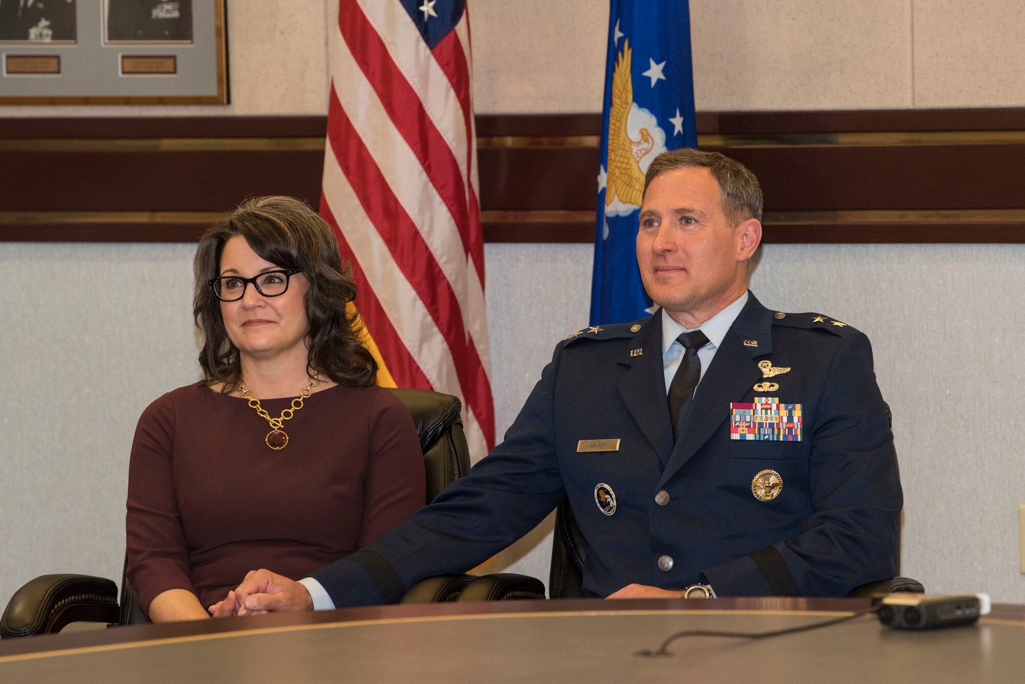 U.S. Air Force Lt. Gen. David A. Krumm sits by his wife, Lisa, during his promotion ceremony April 20, 2020, at Joint Base Elmendorf-Richardson, Alaska. Krumm’s promotion places him as the senior military officer in Alaska, responsible for the integration of all military activities in the Alaskan joint operations area, synchronizing mission operations for more than 21,000 active-duty and reserve forces from all services.