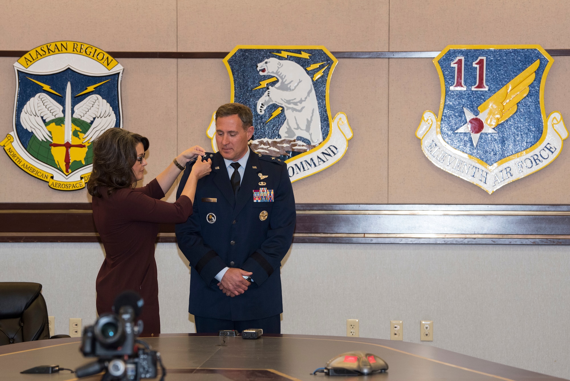 New rank is pinned on U.S. Air Force Lt. Gen. David A. Krumm by his wife, Lisa, during his promotion ceremony April 20, 2020, at Joint Base Elmendorf-Richardson, Alaska. Krumm’s promotion places him as the senior military officer in Alaska, responsible for the integration of all military activities in the Alaskan joint operations area, synchronizing mission operations for more than 21,000 active-duty and reserve forces from all services.