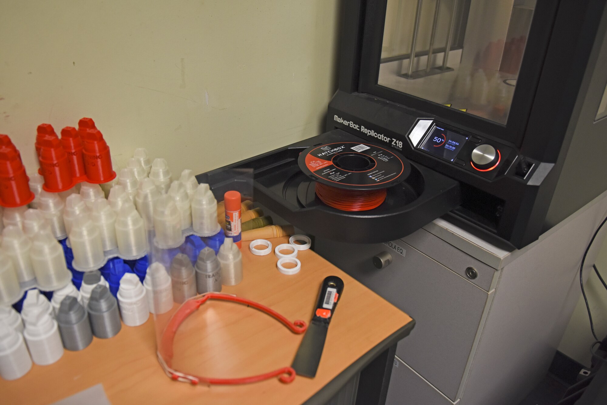 The 8th Civil Engineer Squadron explosive ordnance disposal flight began manufacturing plastic face shields in preparation for mask shortages at Kunsan Air Base, Republic of Korea. EOD created two initial face shield designs, working closely with the 8th Medical Group to ensure the design both protects Airmen and prevents the spread of the disease. (U.S. Air Force photo by Staff Sgt. Mackenzie Mendez)