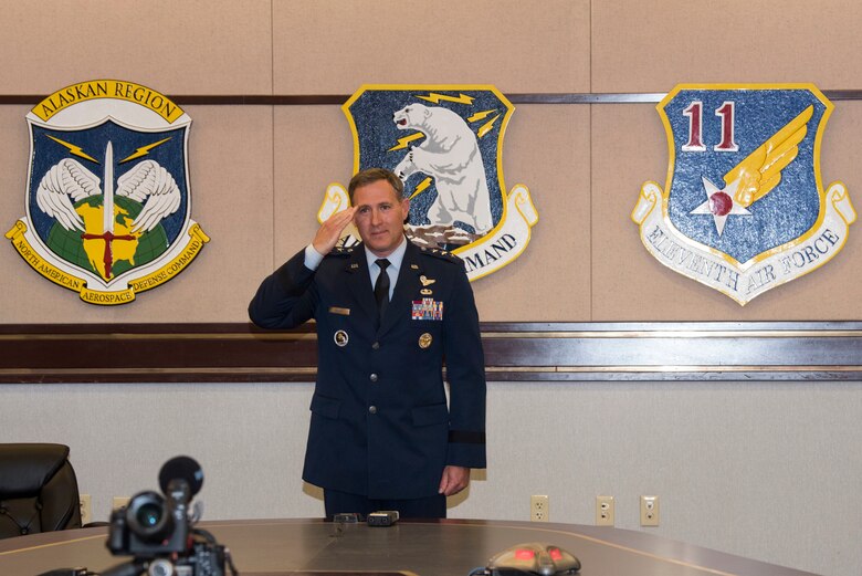 U.S. Air Force Lt. Gen. David A. Krumm renders his first salute as lieutenant general to Air Force Gen. Terrence G. O’Shaughnessy, commander of the North American Aerospace Defense Command and United States Northern command, during his promotion ceremony April 20, 2020, at Joint Base Elmendorf-Richardson, Alaska. O’Shaughnessy was the presiding officer for the ceremony, and attended the event via video teleconference. Krumm’s promotion places him as the senior military officer in Alaska, responsible for the integration of all military activities in the Alaskan joint operations area, synchronizing mission operations for more than 21,000 active-duty and reserve forces from all services.