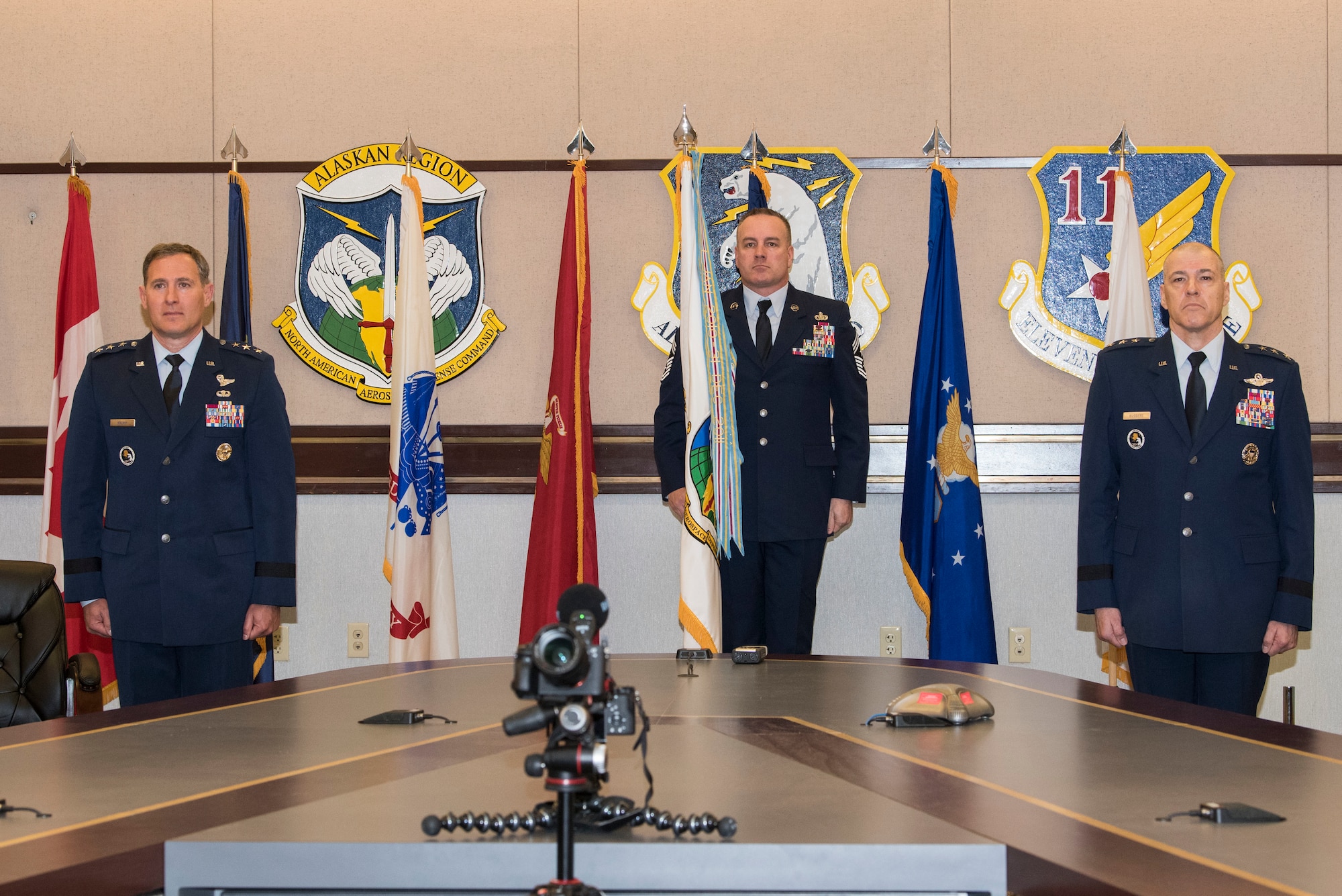 U.S. Air Force Lt. Gen. David A. Krumm takes command of Alaskan North American Aerospace Defense Command, Alaskan Command, and the Eleventh Air Force from outgoing commander, Lt. Gen. Thomas Bussiere, during a change of command ceremony April 20, 2020 at Joint Base Elmendorf-Richardson, Alaska. Due to physical restrictions of the ongoing COVID-19 pandemic, the virtual change of command ceremony was presided over via video teleconference by Air Force Gen. Terrence O’Shaughnessy, commander of the North American Aerospace Defense Command and United States Northern Command, and Air Force Gen. Charles Q. Brown, Pacific Air Forces commander.