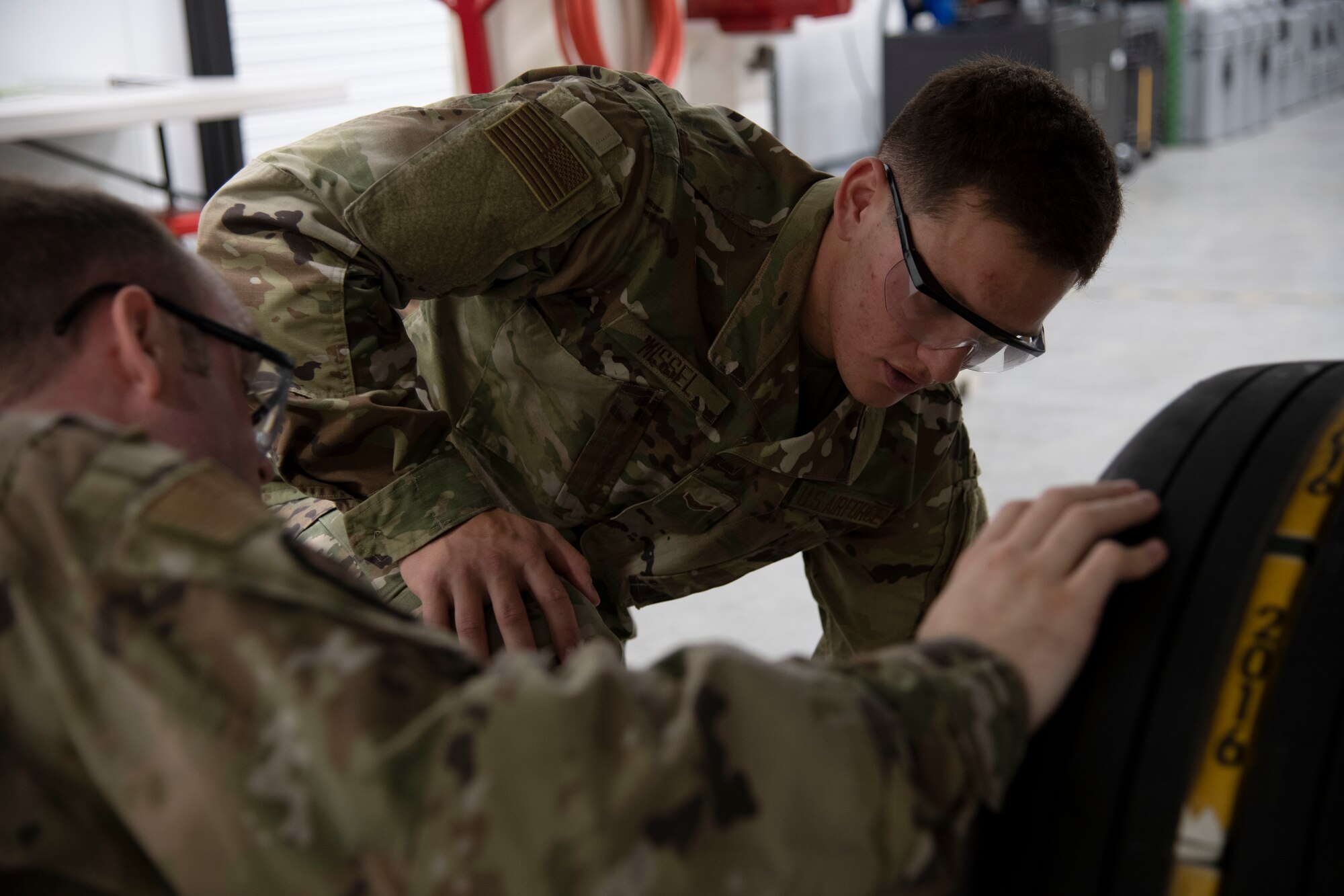 A1C Benjamin Missel inspects a landing gear trainer in the F-35 Academic Training Center, Eglin Air Force Base, Fla. on Mar. 12, 2020.