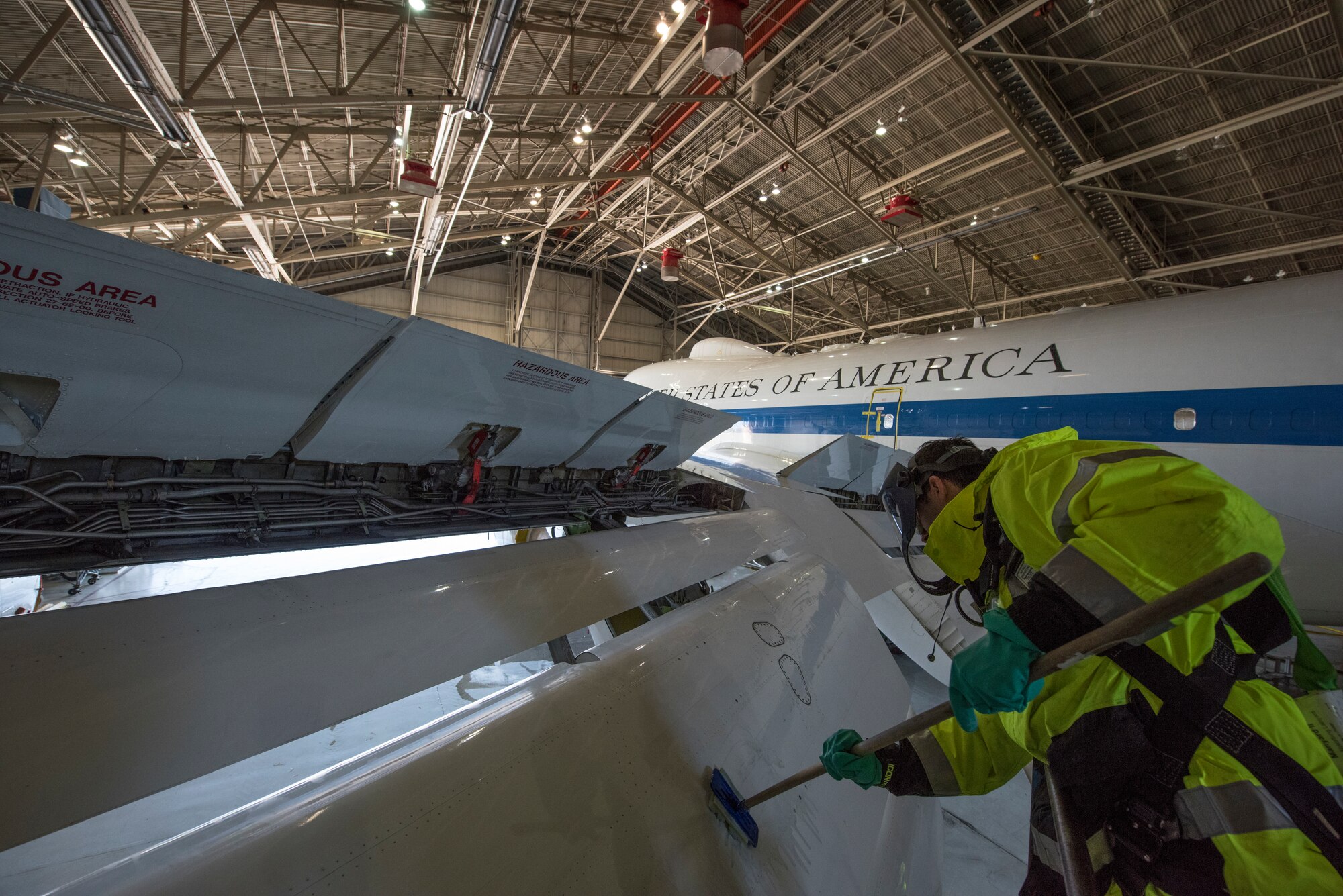 An airman cleans an E-4B at Offutt Air Force Base