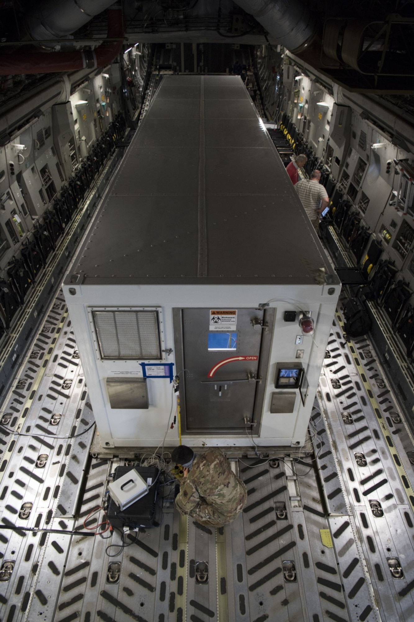 Operational testers from across the Department of Defense to test the Portable Bio-Containment Module on a C-17 Globemaster III at Joint-Base Charleston, S.C.