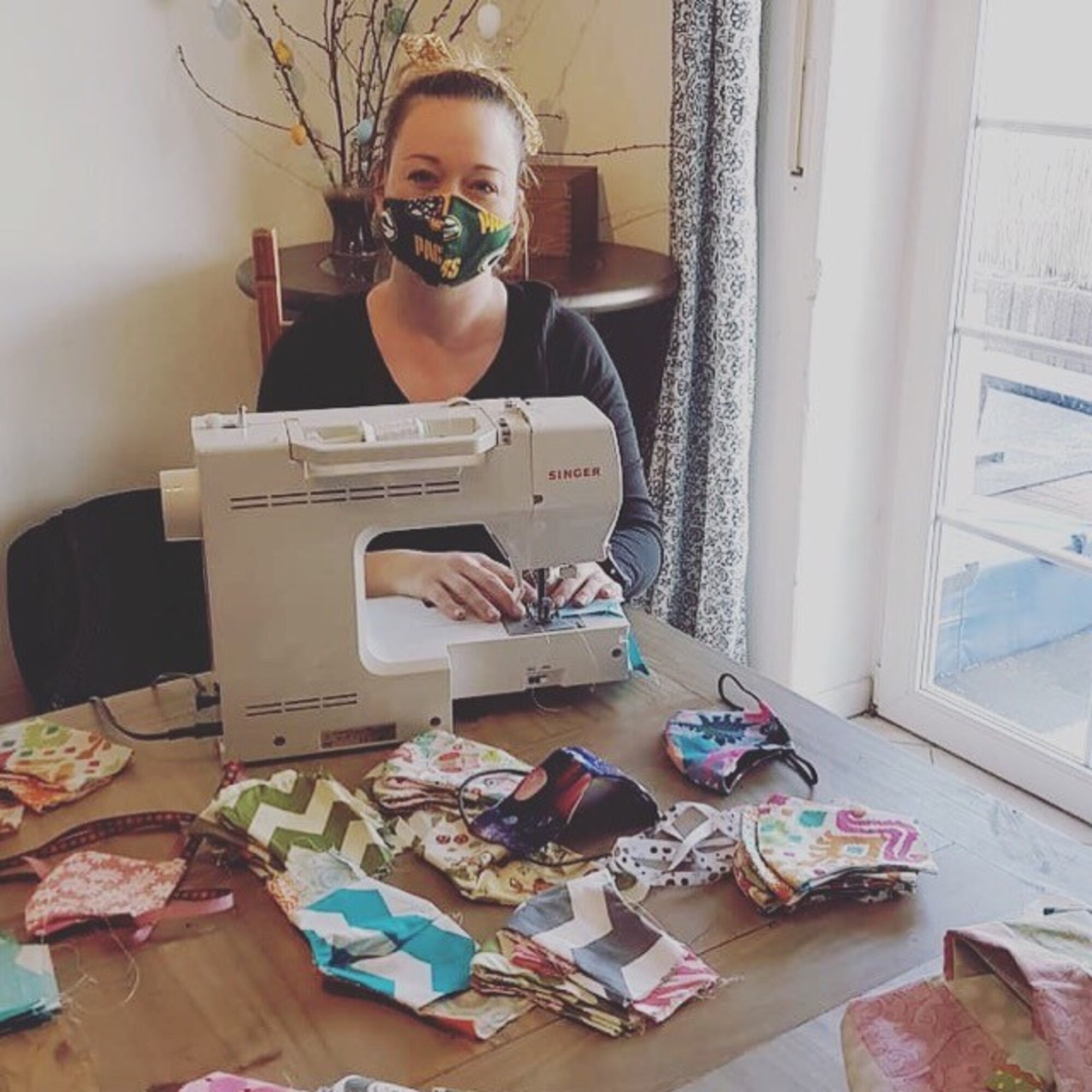 Natasha Teeters, 435th Contingency Response Squadron key spouse, makes cloth face coverings for Airmen and their families.