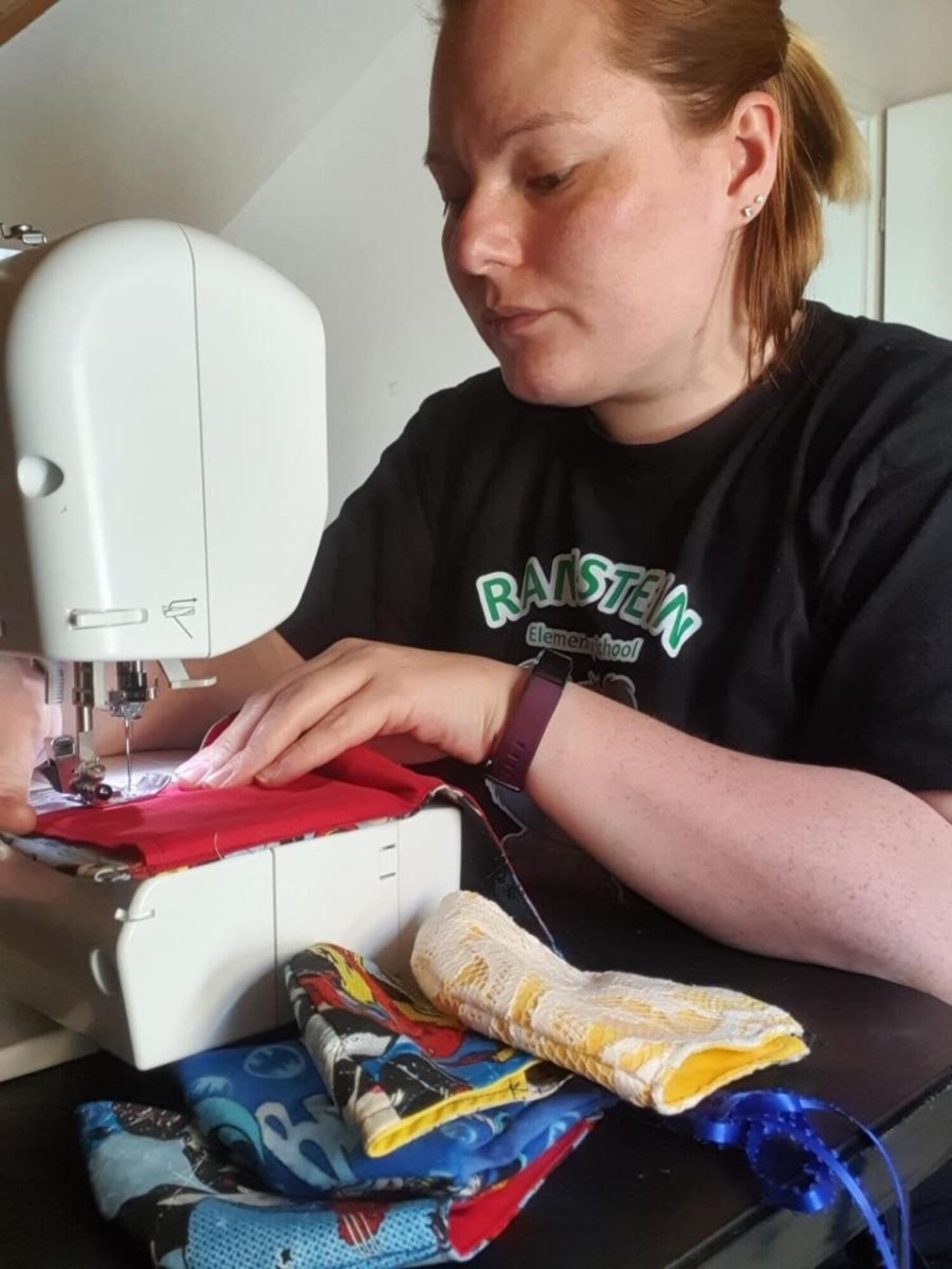 Sydney Montgomery, 435th Contingency Response Squadron key spouse, makes cloth face coverings for Airmen and their families.