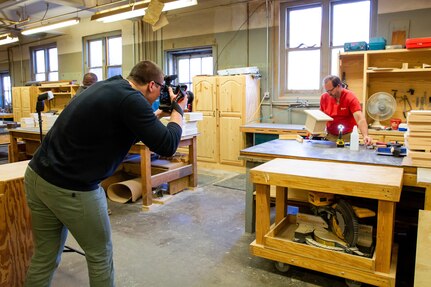 Code 1170 Photographer Danny DeAngelis captures photos of the shipyard-constructed sanitation boxes.