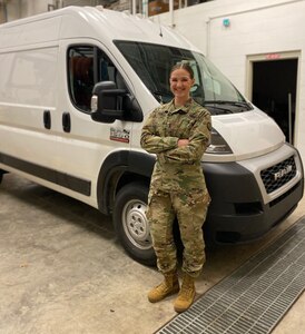 West Virginia Army National Guard 1st Lt. Samantha Fabian, commander of the 1201st Forward Support Company, in front of a mobile COVID-19 testing lab in Morgantown April 21, 2020. Fabian is the program director who leads the mobile laboratories.