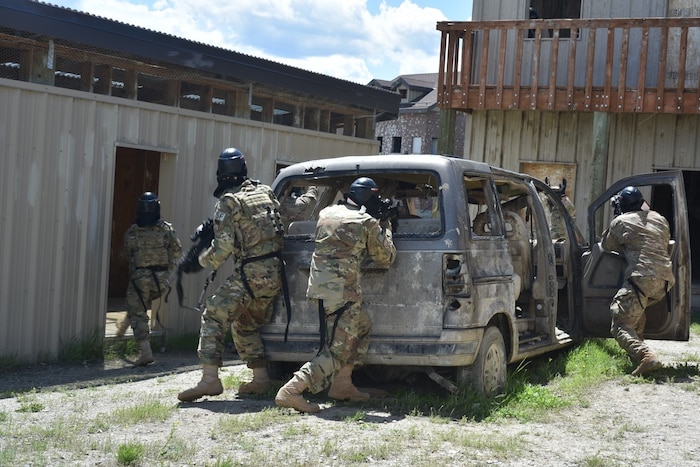 Airmen with the 841st Missile Security Forces Squadron corner an opposing member during a training scenario 24 June 2018 at Fort Harrison, Montana. A new objective, named Guardian Edge, has been established to empower and encourage Airmen to take charge and promote lethality and readiness among their squadron.