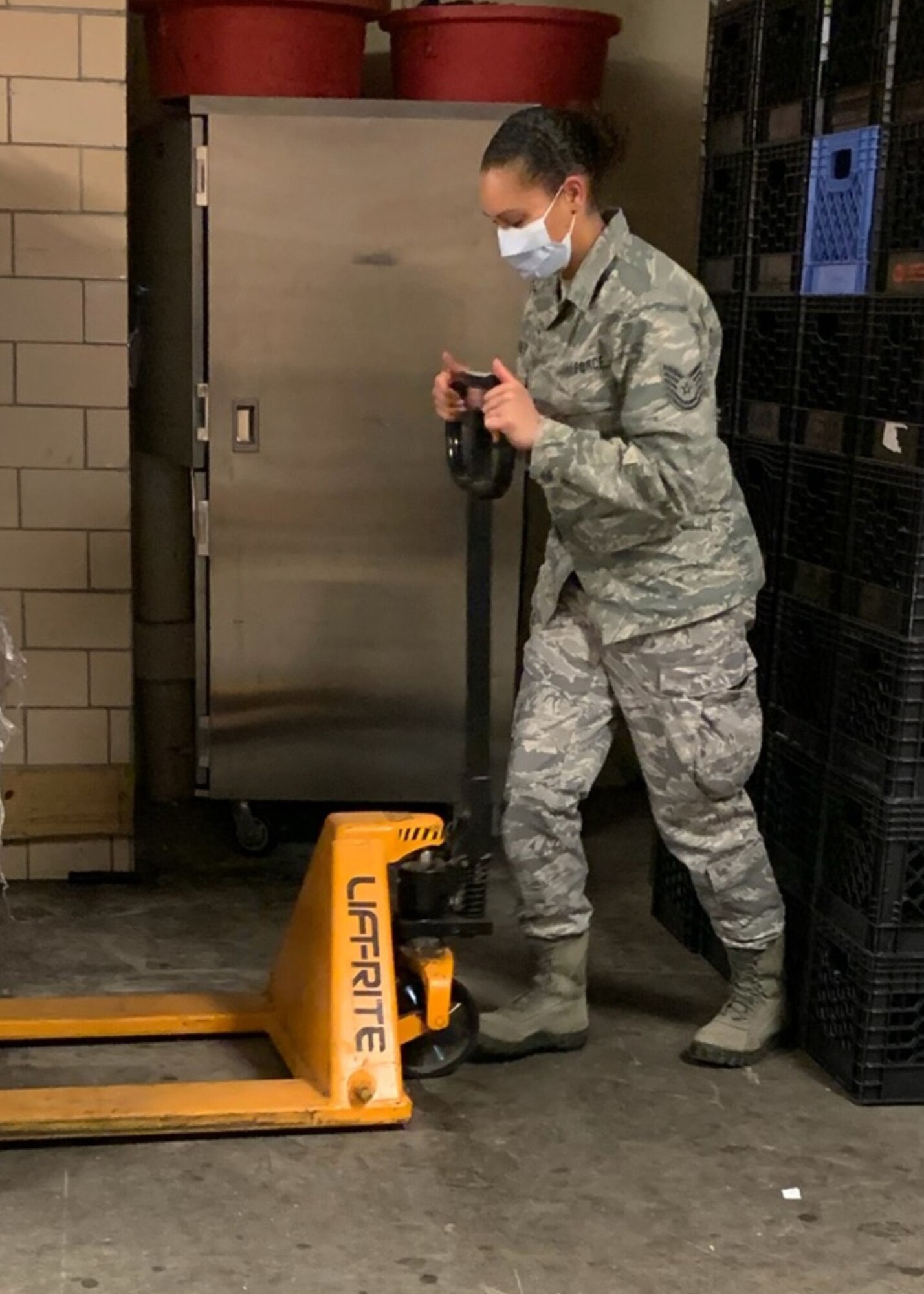 More than 50 members of the 104th Fighter Wing, Barnes Air National Guard Base, Mass., are on orders and leading the way to help the Commonwealth in response to the COVID-19 pandemic. Technical Sgt. Felecia Yager, a personnelist in the 104th Force Support Squadron, has been put on orders and is at the forefront of the mission, looking out for her fellow Airmen to make sure they are good to go, administratively. (Courtesy photo)