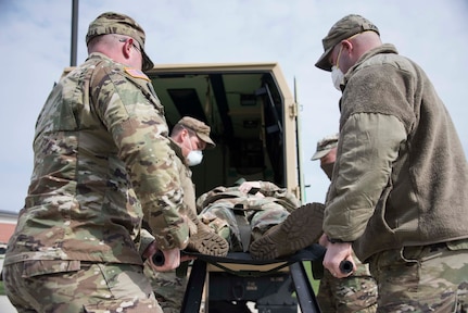 Indiana National Guard troops from the 38th Infantry Division conducted patient transport training at the Johnson County National Guard Armory on April 16, 2020.