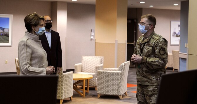 Col. Parker Wright, Commander, National Air and Space Intelligence Center, briefs Secretary of the Air Force Barbara M. Barrett during a visit here, April 21, 2020.  Barrett visited to speak with analysts on the impacts of COVID-19 to mission essential intelligence production. (U.S. Air Force photo by Senior Airman Samuel Earick)