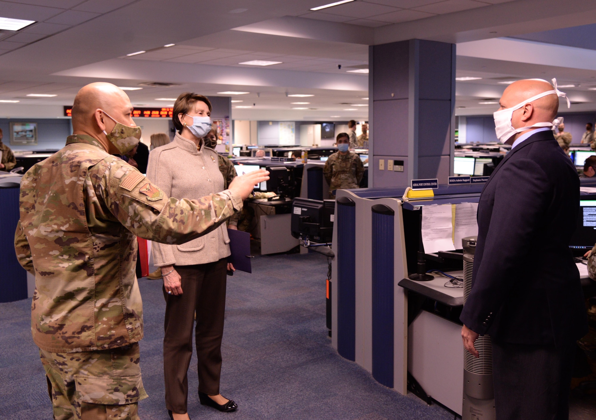 U.S. Air Force Brig. Gen. Jimmy Canlas, 618th Air Operations Center commander, introduces the Honorable Barbara M. Barrett, Secretary of the Air Force, to 618th AOC personnel at Scott Air Force Base, Illinois, April 21, 2020. Barrett visited the 618th Air Operations Center, Air Mobility Command’s execution arm for providing America’s global reach, to see how the team continues to accomplish their mission in light of social distancing requirements. (U.S. Air Force photo by Master Sgt. Mike Andriacco)