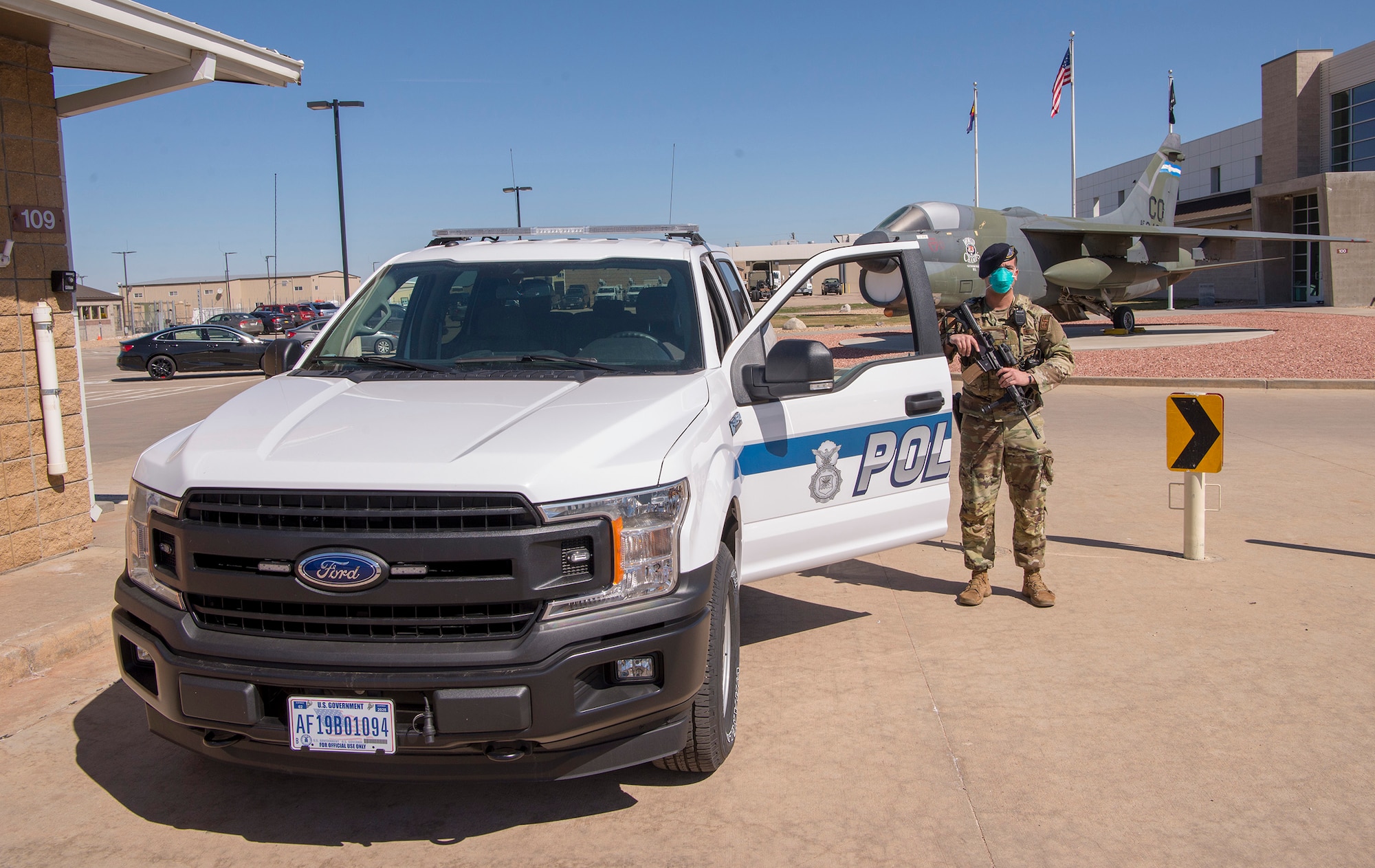 A security forces squadron airman, stands guard at the entry at the 233rd Space Warning Squadron, Greeley Air National Guard Base, Colo.