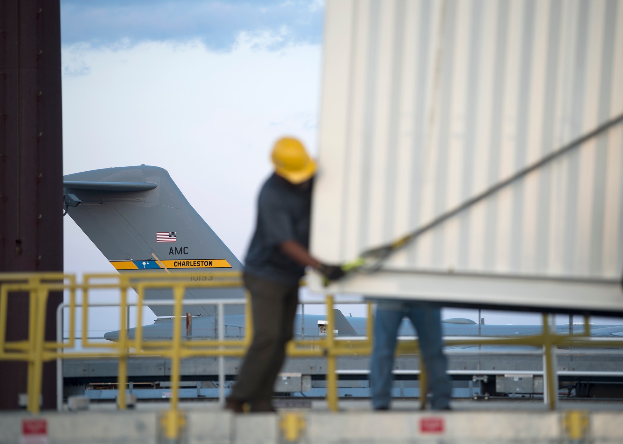 A U.S. Air Force C-17 Globemaster III taxis before take off during the delivery of a Negatively Pressurized Conex prototype at Joint Base Charleston, S.C., April 21, 2020. The NPC will be tested for potential use as a transport module for individuals infected with the COVID-19 virus and other highly infectious diseases. (U.S. Air Force photo by Staff Sgt. Chris Drzazgowski)