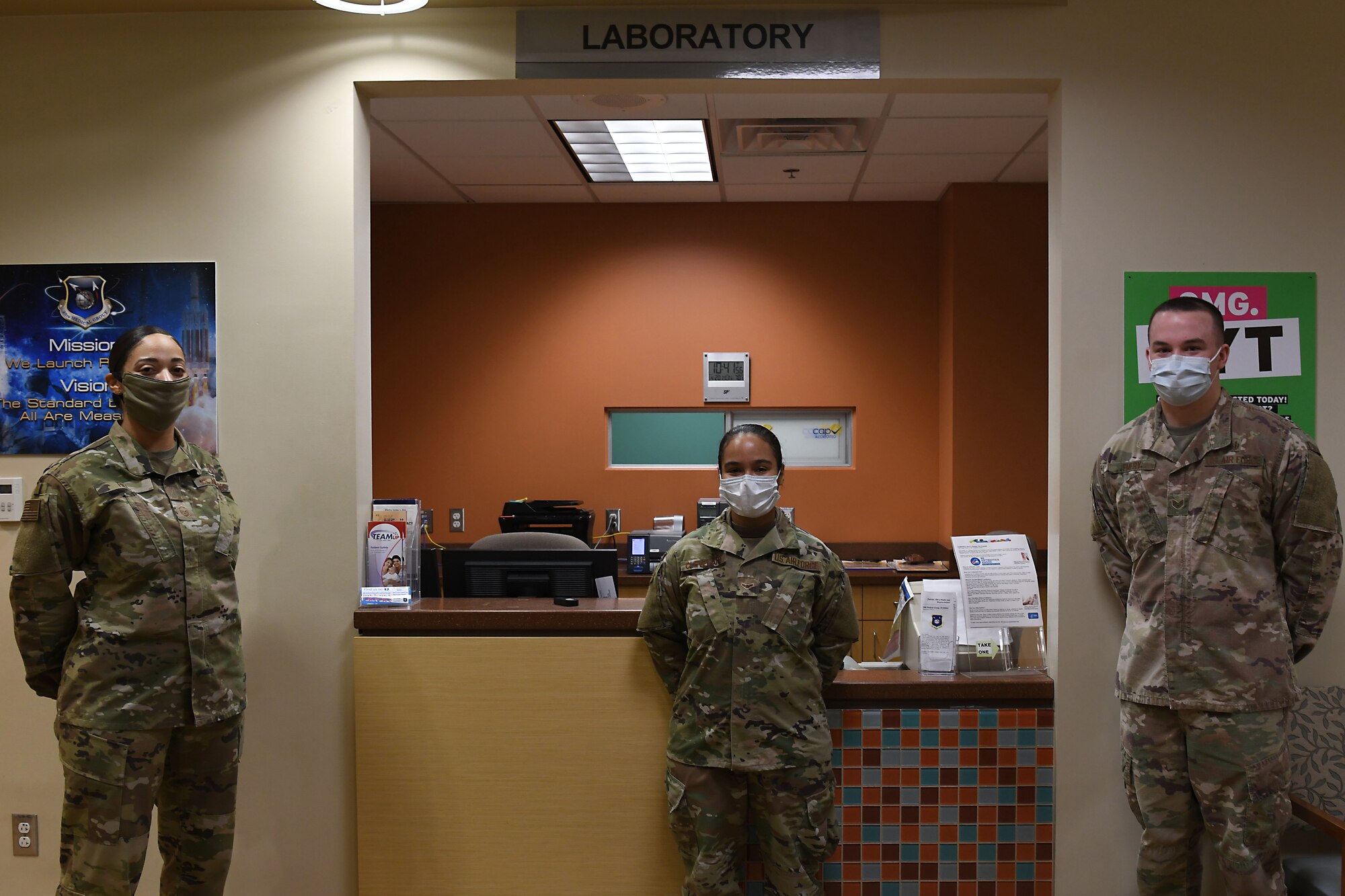 Members assigned to the 30th Healthcare Operations Squadron Laboratory pose for a photo in celebration of Medical Laboratory Professionals Week, also known as Lab Week, April 20, 2020, at Vandenberg Air Force Base, Calif.