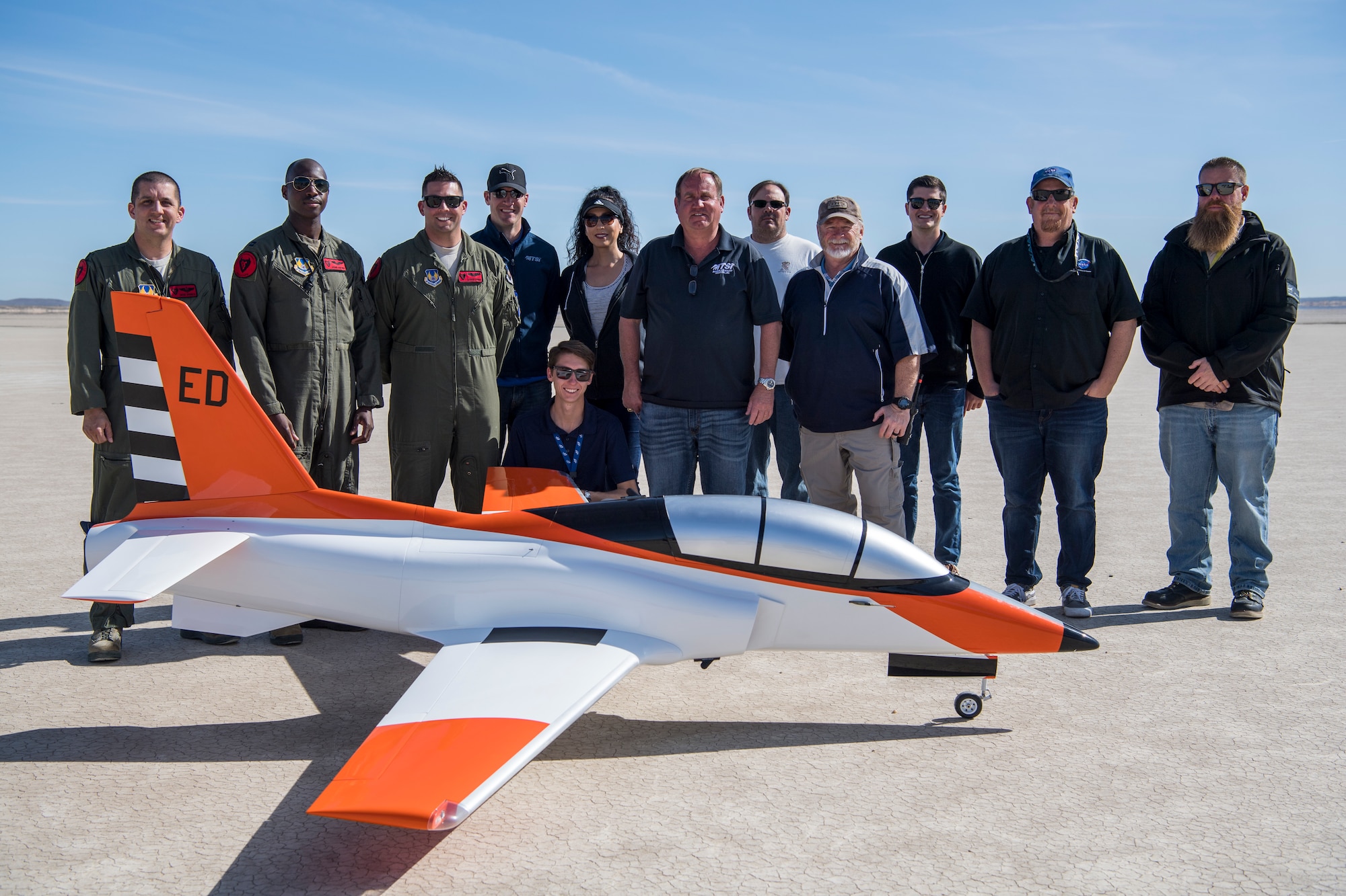 The 412th Test Wing’s Emerging Technology Combined Test Force team pose for a photo with their Bob Violett Models “Renegade” aircraft following a test flight at Edwards Air Force Base, California, March 4. (Air Force photo by Chris Dyer)