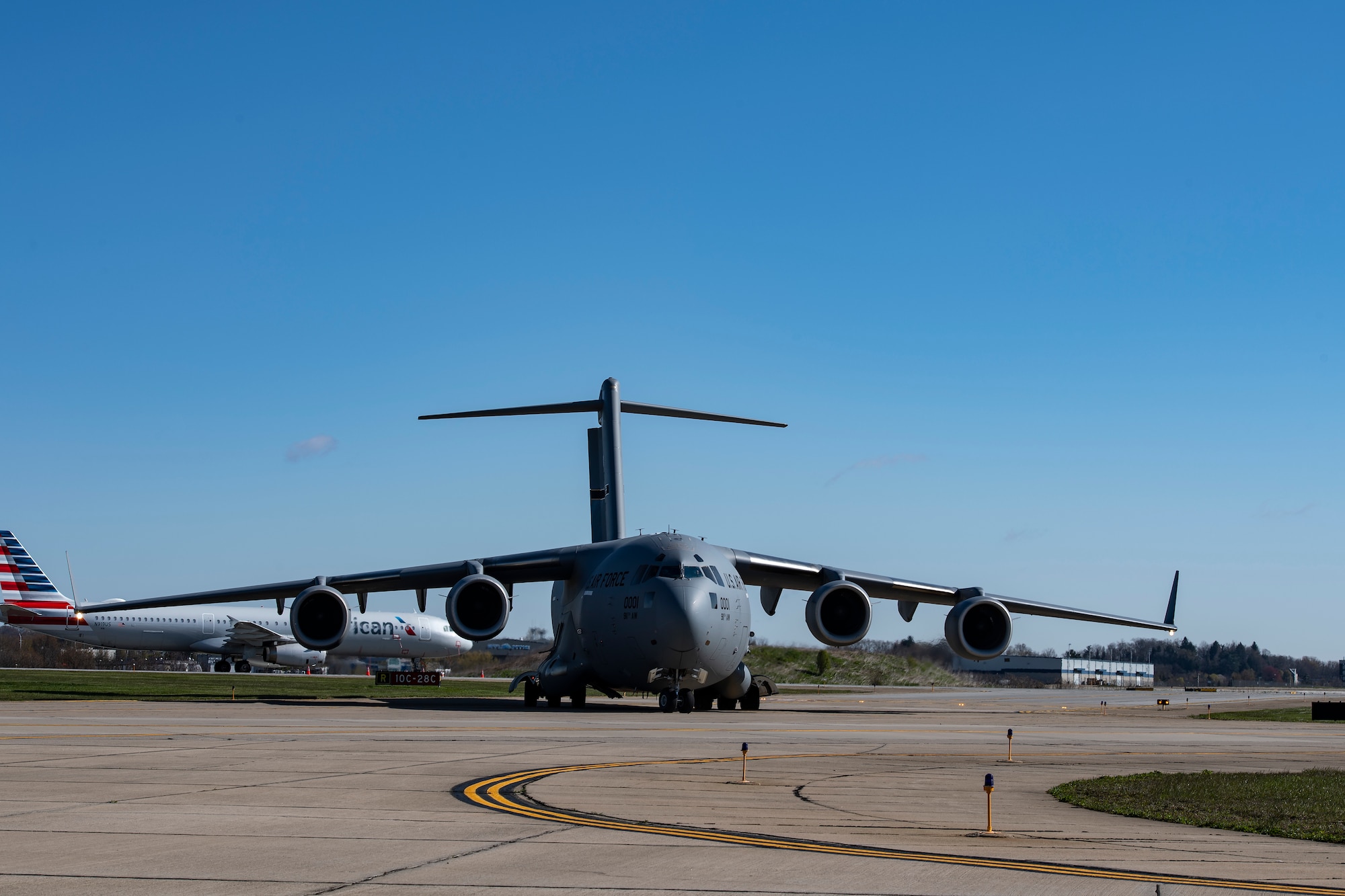 A C-17 Globemaster III assigned to the 911th Airlift Wing taxis to the runway before departing Pittsburgh International Airport Air Reserve Station, Pennsylvania, April 22, 2020.