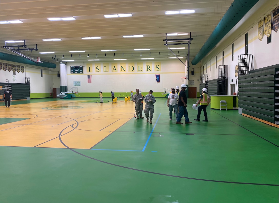 Representatives from the U.S. Army Corps of Engineers (USACE), Honolulu District, the government of Guam, the Federal Emergency Management Agency (FEMA), NAVFAC Marianas, U.S. Department Health and Human Services, and 18th MEDCOM conducted a site assessment April 22 of the John F. Kennedy High School gymnasium in Tamuning for potential future use as Alternate Care Facility.