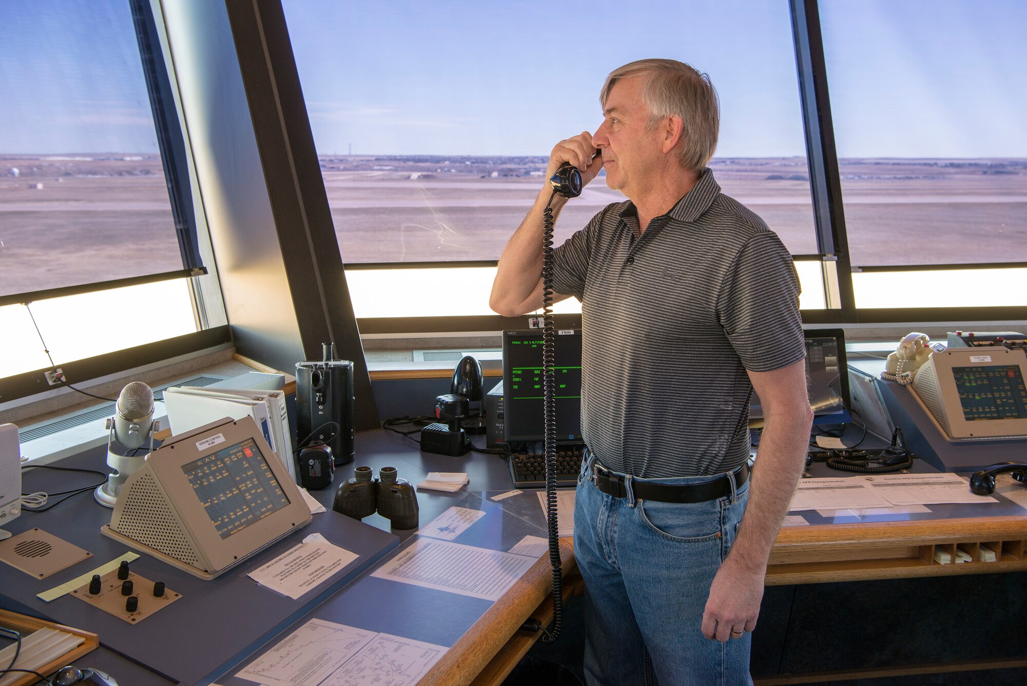 ATC Tower controller talking on radio