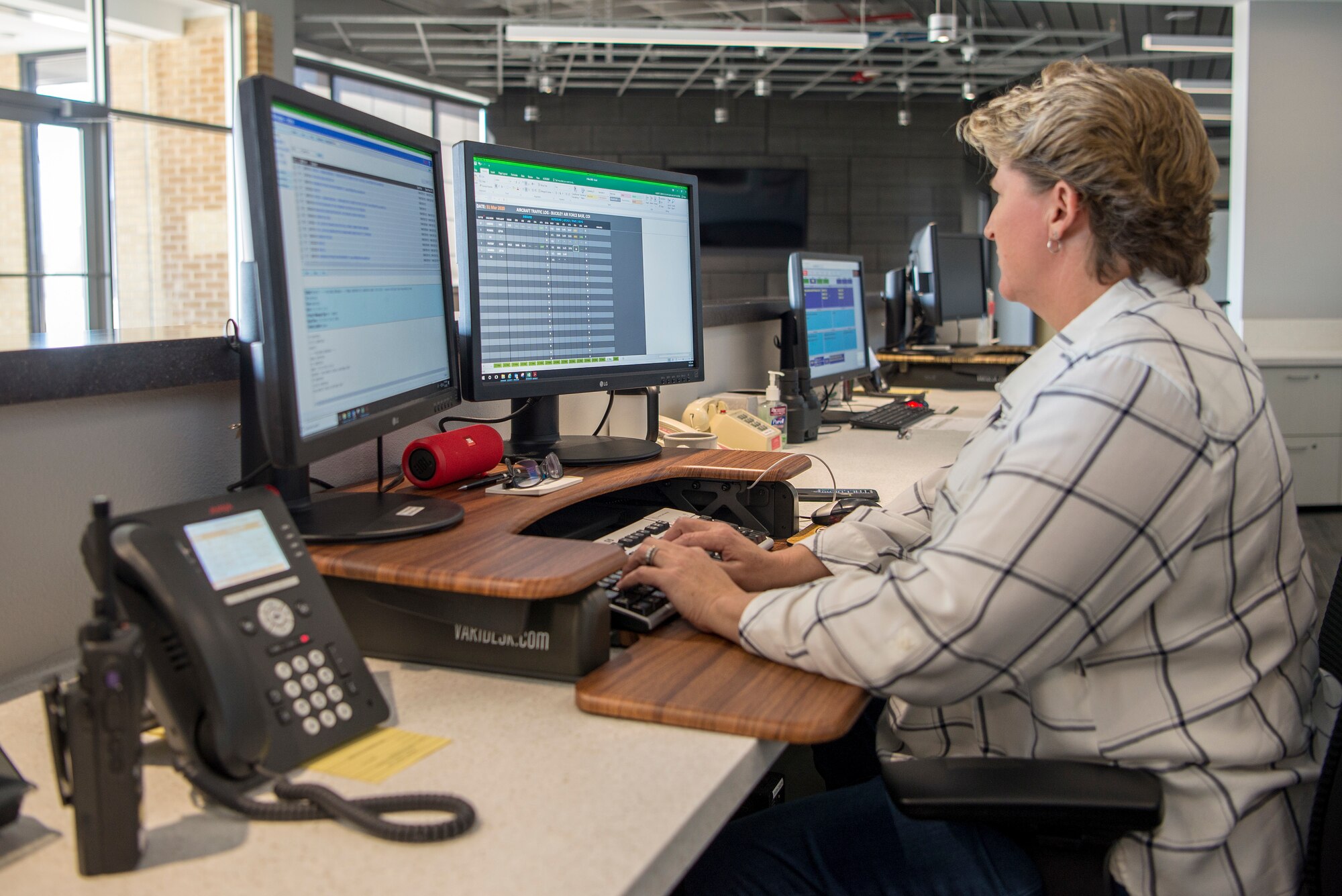 Base Operations controller working on computer