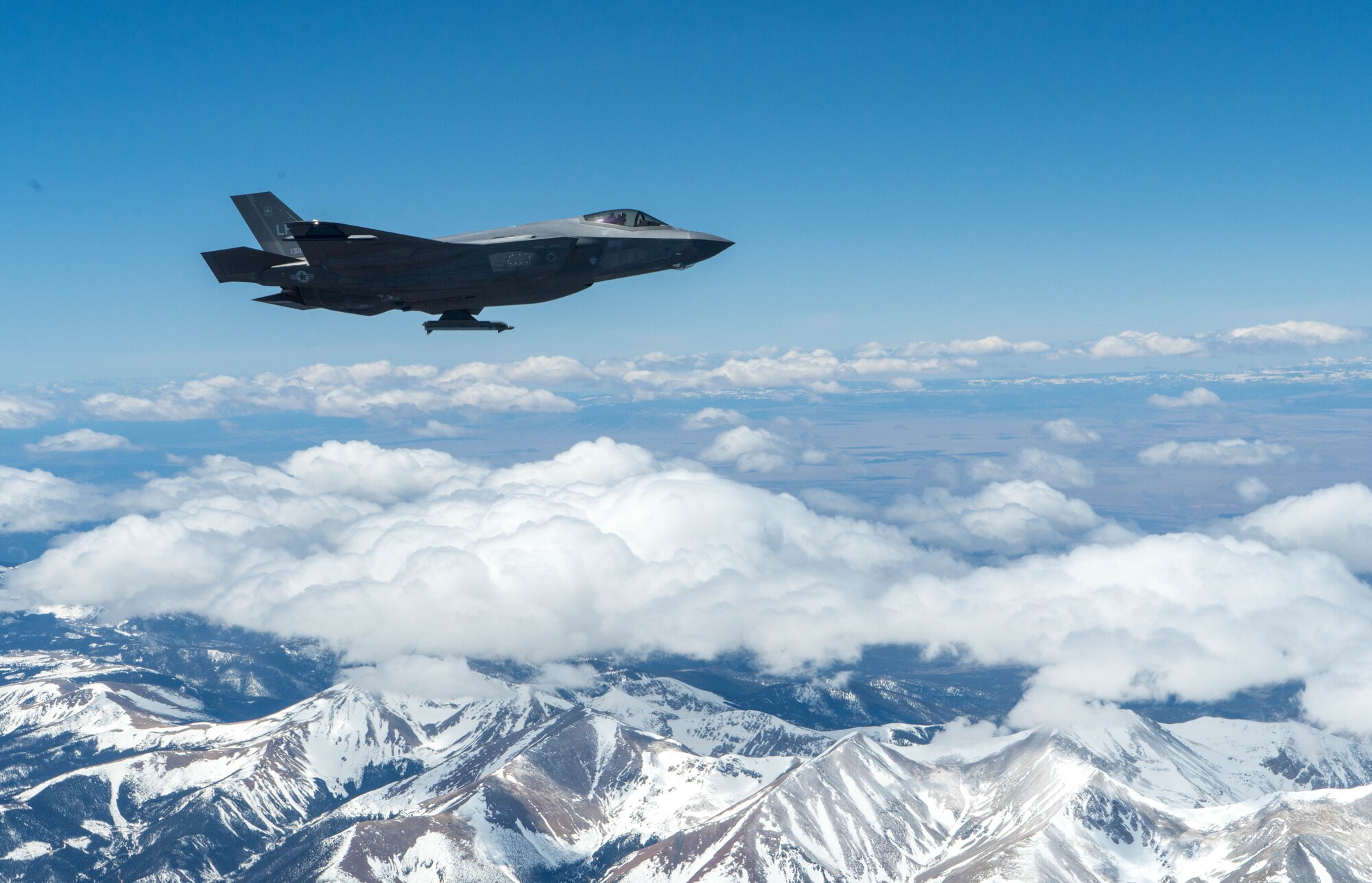 An F-35A Lightning II, assigned to the 56th Fighter Wing, at Luke Air Force Base, Ariz., flies over Colorado en route to the Air Force Academy April 17, 2020.