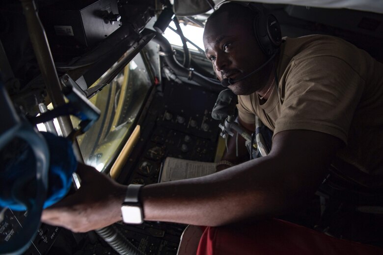 77 ARS boom operator in a the boom pod of a KC-135 Stratotanker.