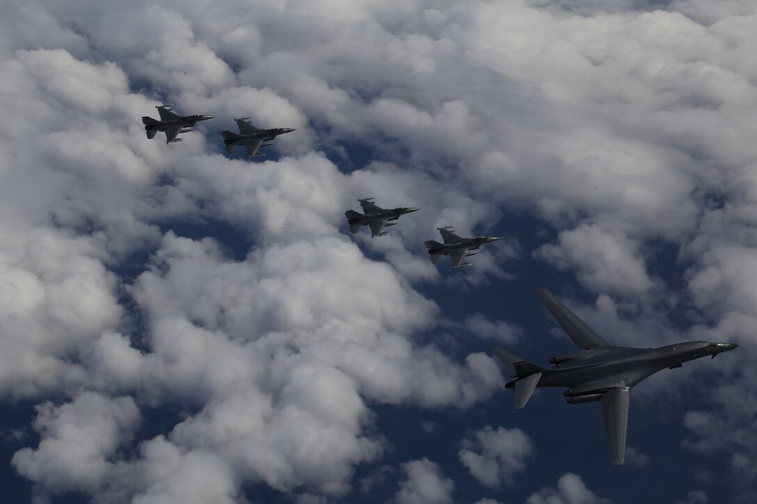 A U.S. Air Force B-1B Lancer from Ellsworth Air Force Base, S.D. and F-16 Fighting Falcons from Misawa Air Base, Japan, conducted bilateral joint training with Japan Air Self-Defense Force (JASDF) F-2s and F-15s off the coast of Northern Japan, April 22, 2020. U.S. Strategic Command's bomber forces regularly conduct combined theater security cooperation engagements with allies and partners, demonstrating U.S. capability to command, control and conduct bomber missions around the world. (Courtesy photo by the Japan Air-Self Defense Force)