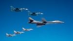 A U.S. Air Force B-1B Lancer from Ellsworth Air Force Base, S.D. and F-16 Fighting Falcons from Misawa Air Base, Japan, conducted bilateral joint training with Japan Air Self-Defense Force (JASDF) F-2s off the coast of Northern Japan, April 22, 2020. U.S. Strategic Command's bomber forces regularly conduct combined theater security cooperation engagements with allies and partners, demonstrating U.S. capability to command, control and conduct bomber missions around the world. (U.S. Air Force photo by Tech. Sgt. Timothy Moore)