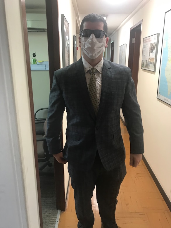 Bahrain Resident Office project manager forward CPT Grant Wanamaker, COVID-19 style, prepares to venture out to meet with stockholders and take delivery of some vital documents.