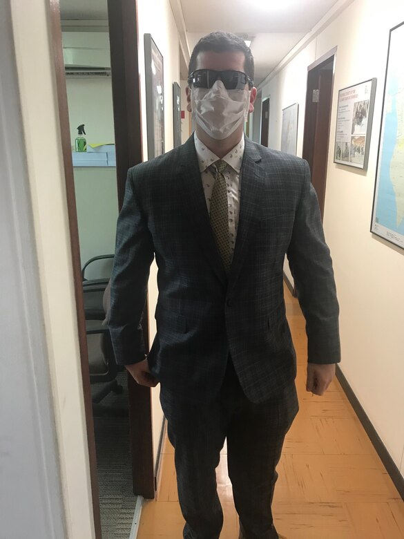 Bahrain Resident Office project manager forward CPT Grant Wanamaker, COVID-19 style, prepares to venture out to meet with stockholders and take delivery of some vital documents.