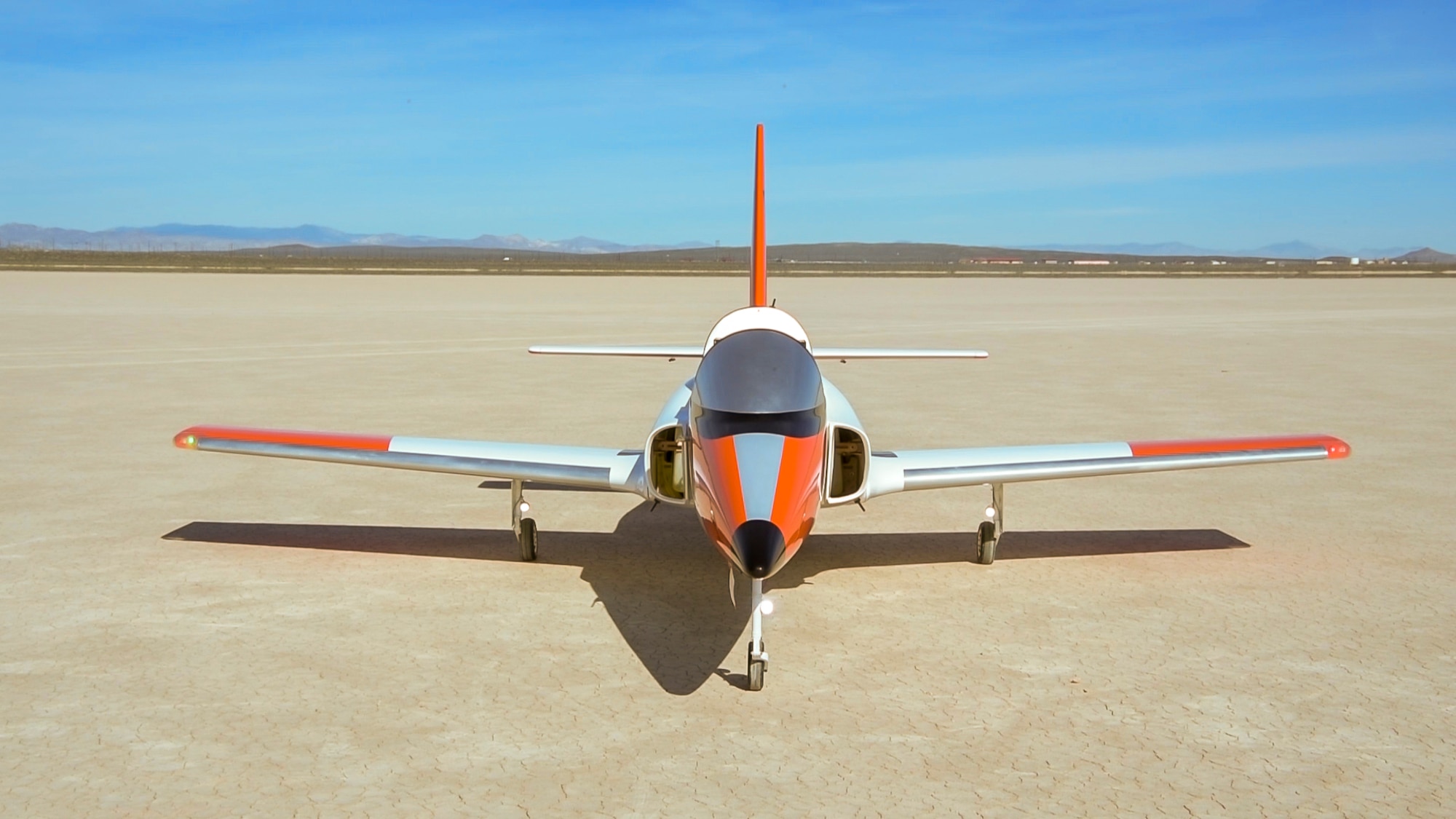 A Bob Violett Models ‘Renegade’ commercial, off-the-shelf, turbine-powered jet aircraft, is parked at a dry lake bed prior to a test flight at Edwards Air Force Base, March 4. The aircraft will be used as an autonomous software test bed by the 412th Test Wing's Emerging Technology Combined Test Force. (Air Force photo by Chris Dyer)