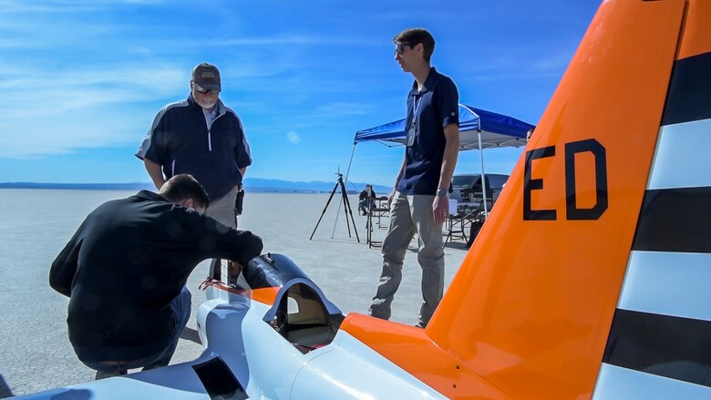 Members of 412th Test Wing’s Emerging Technology Combined Test Force, prepare a Bob Violett Models “Renegade” aircraft prior to a flight test on Edwards Air Force Base, California, March 4. (Air Force photo by Chris Dyer)