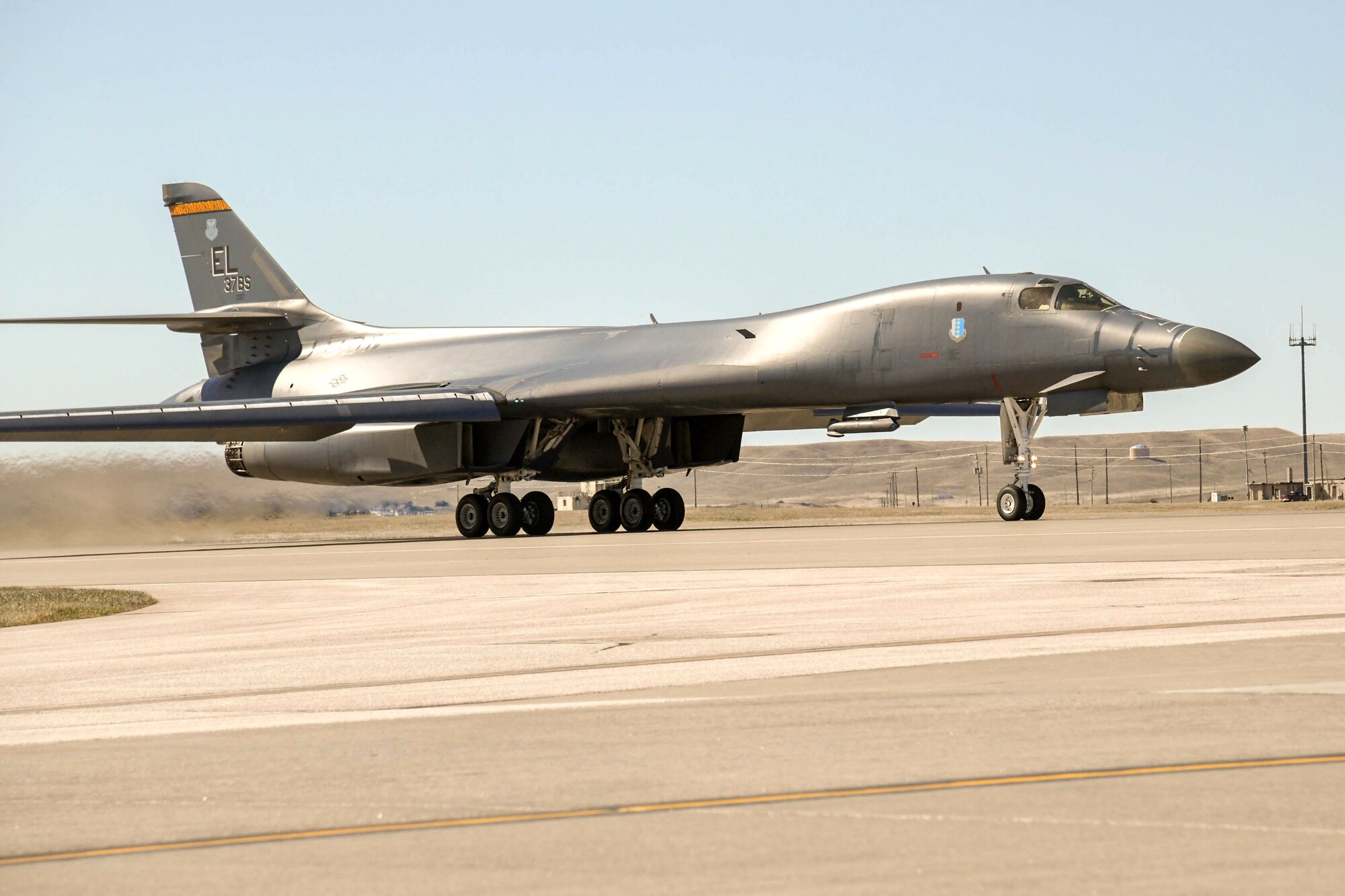 A U.S. Air Force B-1B Lancer taxis prior to departing Ellsworth Air Force Base, S.D., April 21, 2020. The B-1 bomber flew from the continental United States and integrated with the Koku Jieitai (Japan Air Self Defense Force or JASDF) to conduct bilateral and theater familiarization training near Japan. (U.S. Air Force photo by Senior Airman Michael Jones)