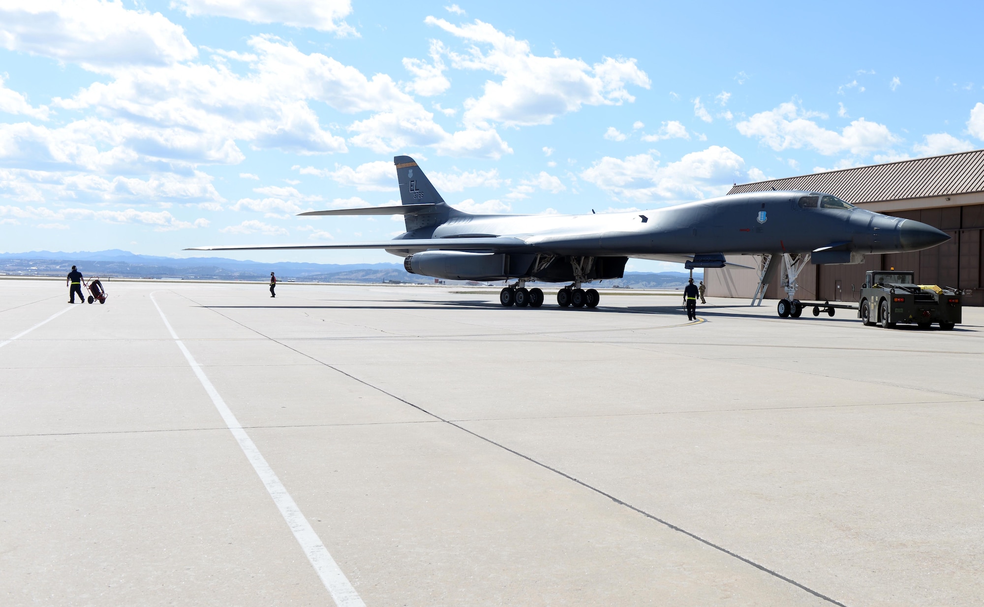 A B-1B Lancer is towed to a parking spot on the apron of the airfield at Ellsworth Air Force Base, S.D., April 22, 2020.