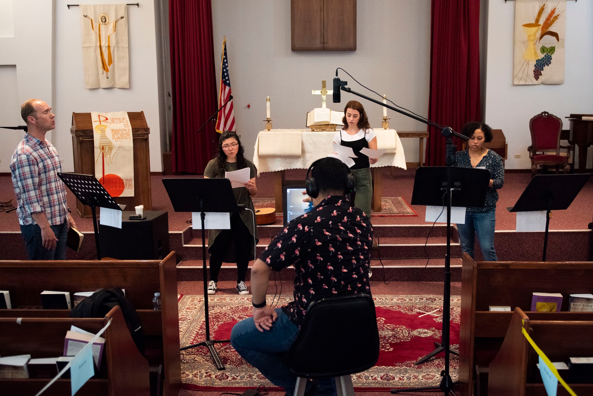Photo of chapel staff and volunteers recording a worship service