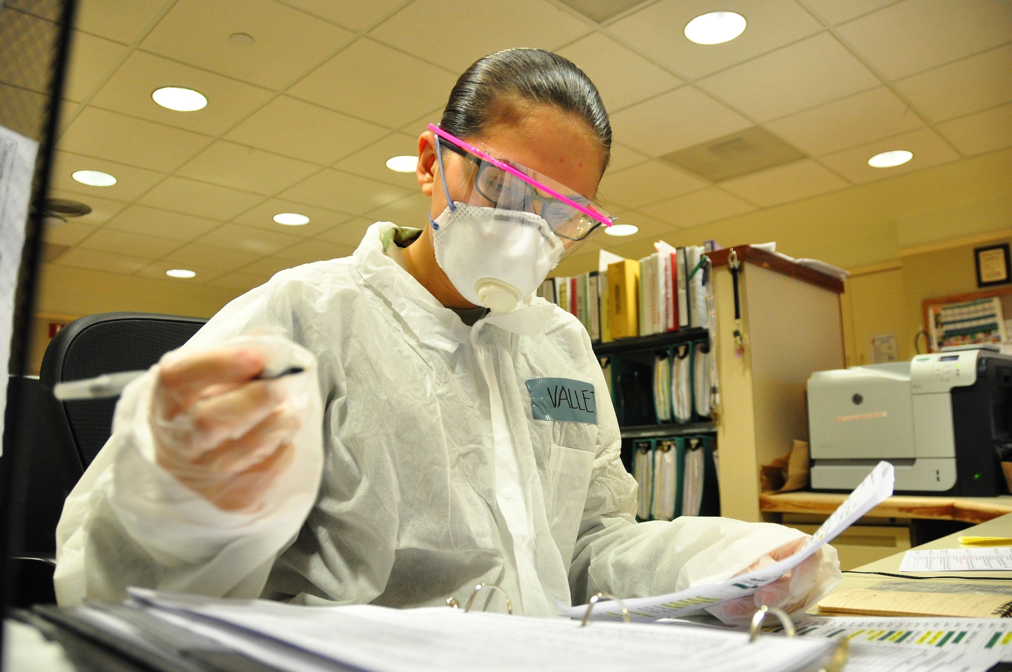 A picture of U.S. Army Pfc. Victoria Vallejo, a Motor Transport Operator with the 250th Brigade Support Battalion, New Jersey Army National Guard, updating medical paperwork.