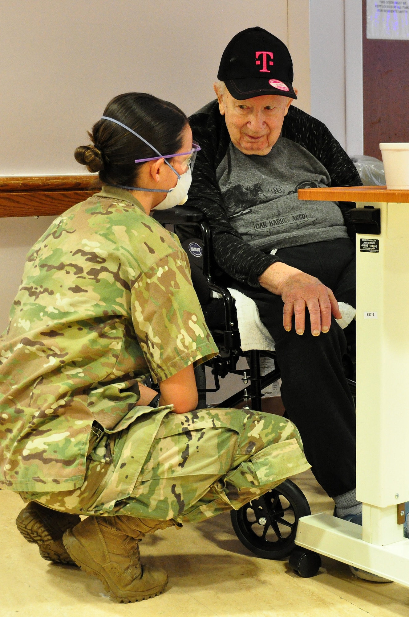 U.S. Army Spc. Laurel Yerg, a Combat Medic with the 1st Battalion, 114th Infantry Regiment, New Jersey Army National Guard, checking on a resident.