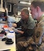 U.S. Army Reserve Sgt. 1st Class Blayne Peterson, right, a combat medic with the 773rd Civil Support Team, 7th Mission Support Command from Kaiserslautern, Germany, and Maj. Dmitry Pervistky, a bio-chemist with the 773rd CST, conduct testing for COVID-19 in a mobile lab at Drawsko Pomorskie Training Area, Poland, April 14, 2020. A team of four Soldiers from the 773rd CST is charged with testing incoming personnel to ensure they are not introducing COVID to a relatively COVID-free environment.

(U.S. Army Reserve photo by 1st Sgt. Domenic Barbeiro/Released)