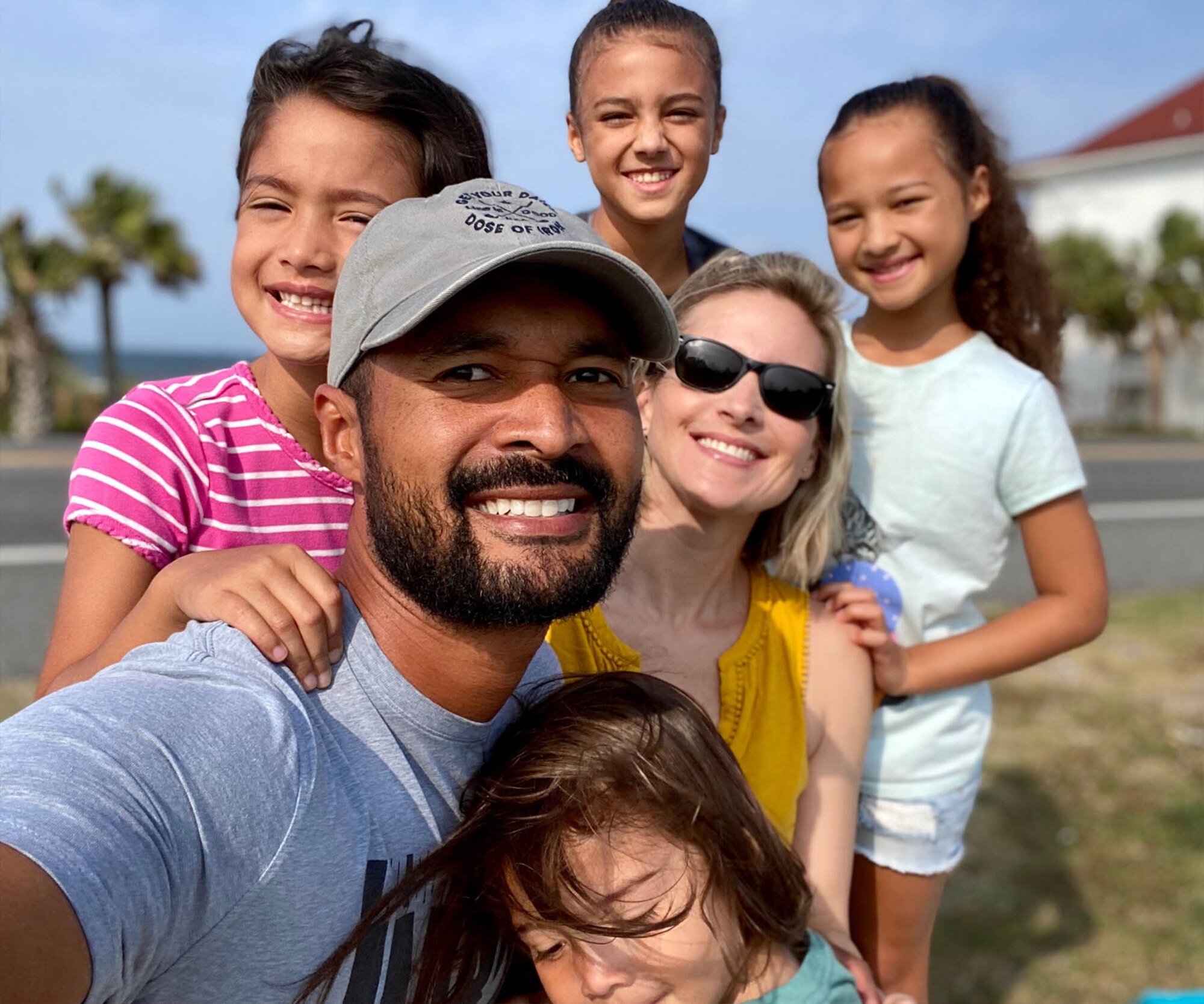 The Bowles family gathers for a photo during a daily walk around their neighborhood. Maj. Sarah Bowles, 325th Logistics Readiness Squadron commander, and her husband, Terry, help their children adjust to a new normal during the COVID-19 pandemic. (Courtesy Photo)