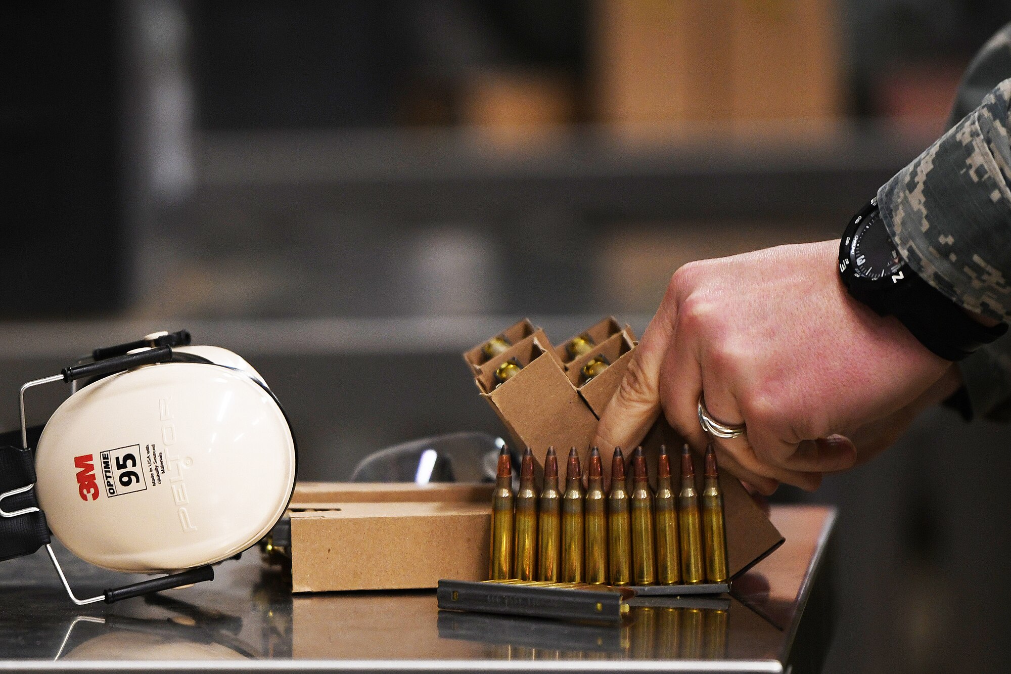 A security forces augmentee in training prepares ammunition during training at Royal Air Force Feltwell, England, April 17, 2020. The Security Forces Augmentee Program consists of a three-day course of classroom instructions and hands-on training. (U.S. Air Force photo by Senior Airman Shanice Williams-Jones)