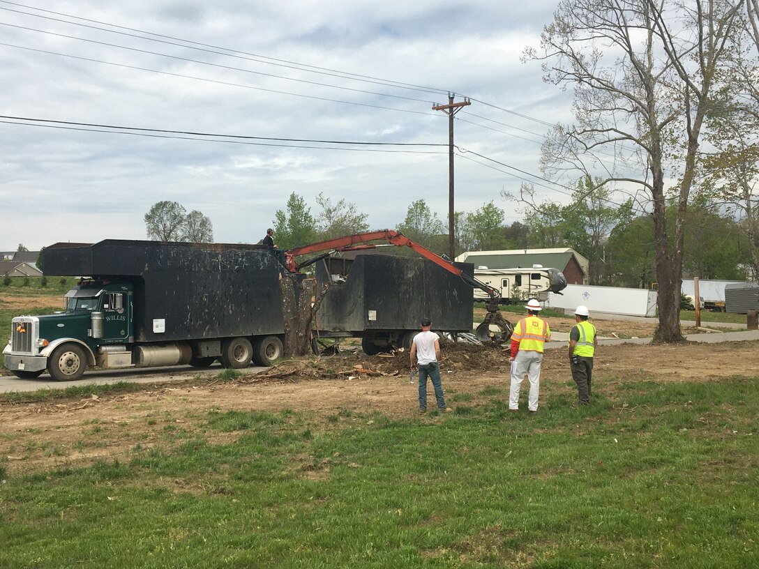 Bernie Bell (center), land surveyor with the U.S. Army Corps of Engineers Mobile District, observes a debris removal operation April 19, 2020 in Putnam County, Tennessee. Bell supported a FEMA debris monitoring mission following tornadoes that devastated middle Tennessee March 3, 2020. (USACE Photo)