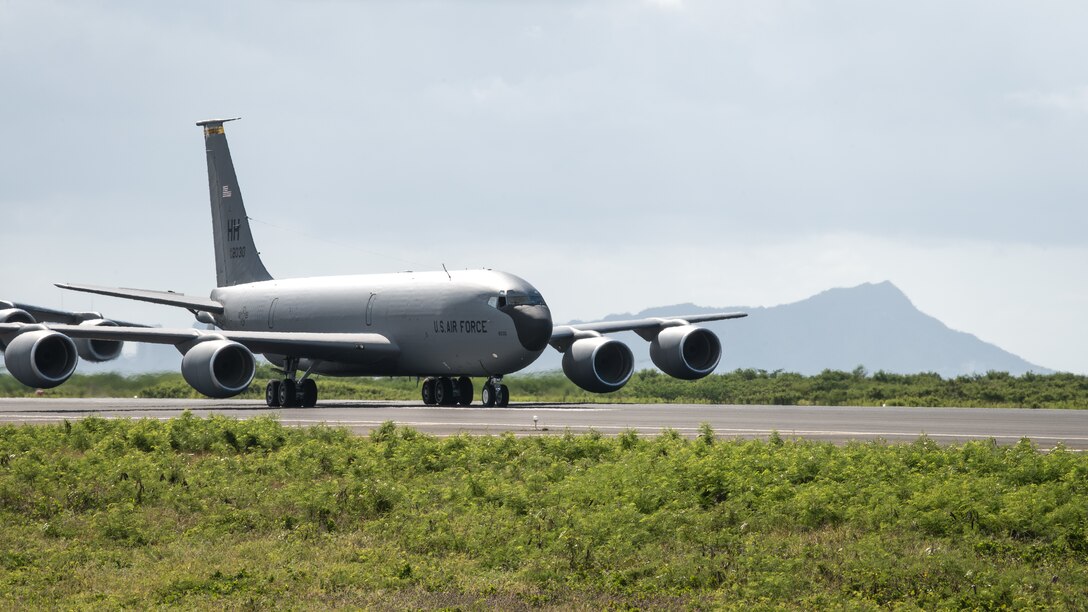 A U.S. Air Force KC-135 Stratotanker taxis on the runway during a routine training schedule April 21, 2020, at Honolulu International Airport, Hawaii. Given the low traffic at the airport due to COVID-19 mitigation efforts, the active-duty 15th Wing and the Hawaii Air National Guard’s 154th Wing seized
an opportunity to document the operation which showcases readiness and their unique Total Force Integration construct. The units of Team Hickam work together seamlessly to deliver combat airpower, tanker fuel, and humanitarian support and disaster relief across the Indo-Pacific. (U.S. Air
National Guard photo by Senior Airman John Linzmeier)