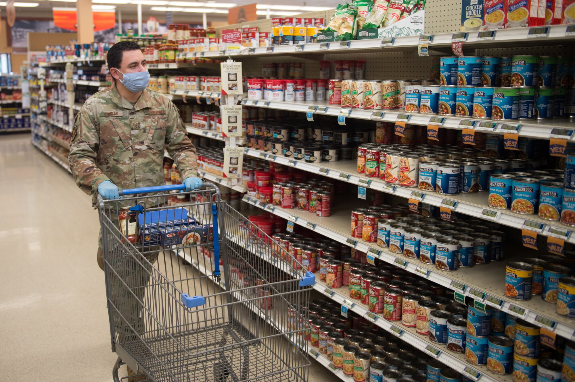 Tech. Sgt. Justin Aguilar, logistics test and evaluator, 412th Maintenance Logistics Test Squadron, shops for essentials at the Edwards Air Force Base commissary, April 22.  (Photo by Christian Turner)