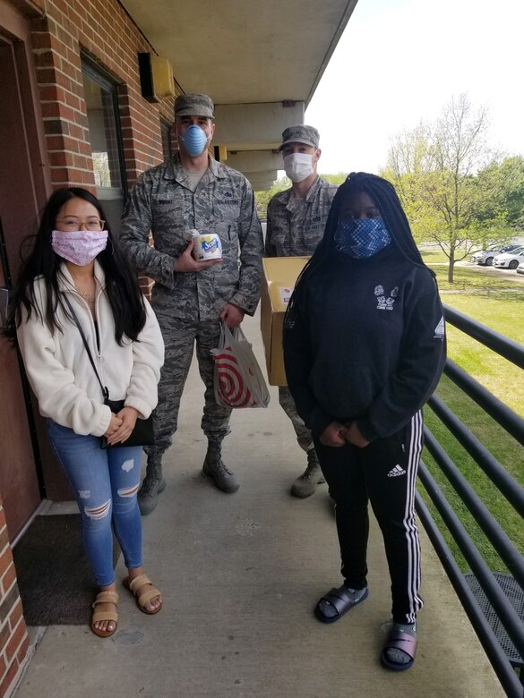 Homemade masks are distributed to U.S. Air Force Airmen living in the dorms at Joint Base Langley-Eustis, Virginia, April 16, 2020. The masks were made by members of the Langley Spouses Club. (Courtesy photo)
