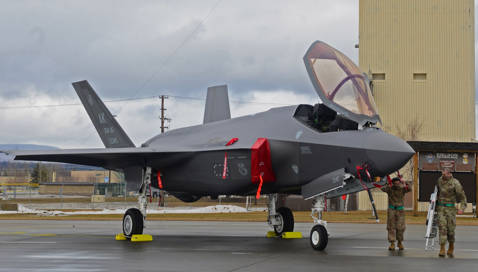 U.S. Air Force Staff Sgt. Christopher Mashek and Staff Sgt. Steven Krutke, both from the 356th Aircraft Maintenance Unit, perform post flight procedures on the squadron’s first assigned F-35A Lighting II fifth-generation fighter at Eielson Air Force Base, Alaska, April 21, 2020.